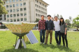 Project team with Hydrolily prototype and solar panel