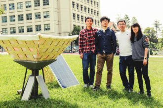 Project team with Hydrolily prototype and solar panel