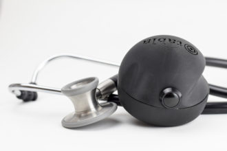 view of Tabla prototype (black spherical device) with stethoscope