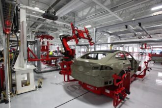 View of car assembly at Tesla factory