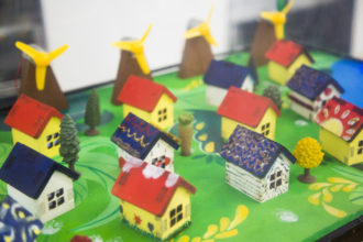 Miniature houses -- part of a prototype interactive display about climate change.