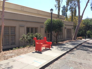 Photo of bench on display outside.