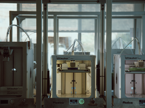 Photo of three Ultimaker 3D printers